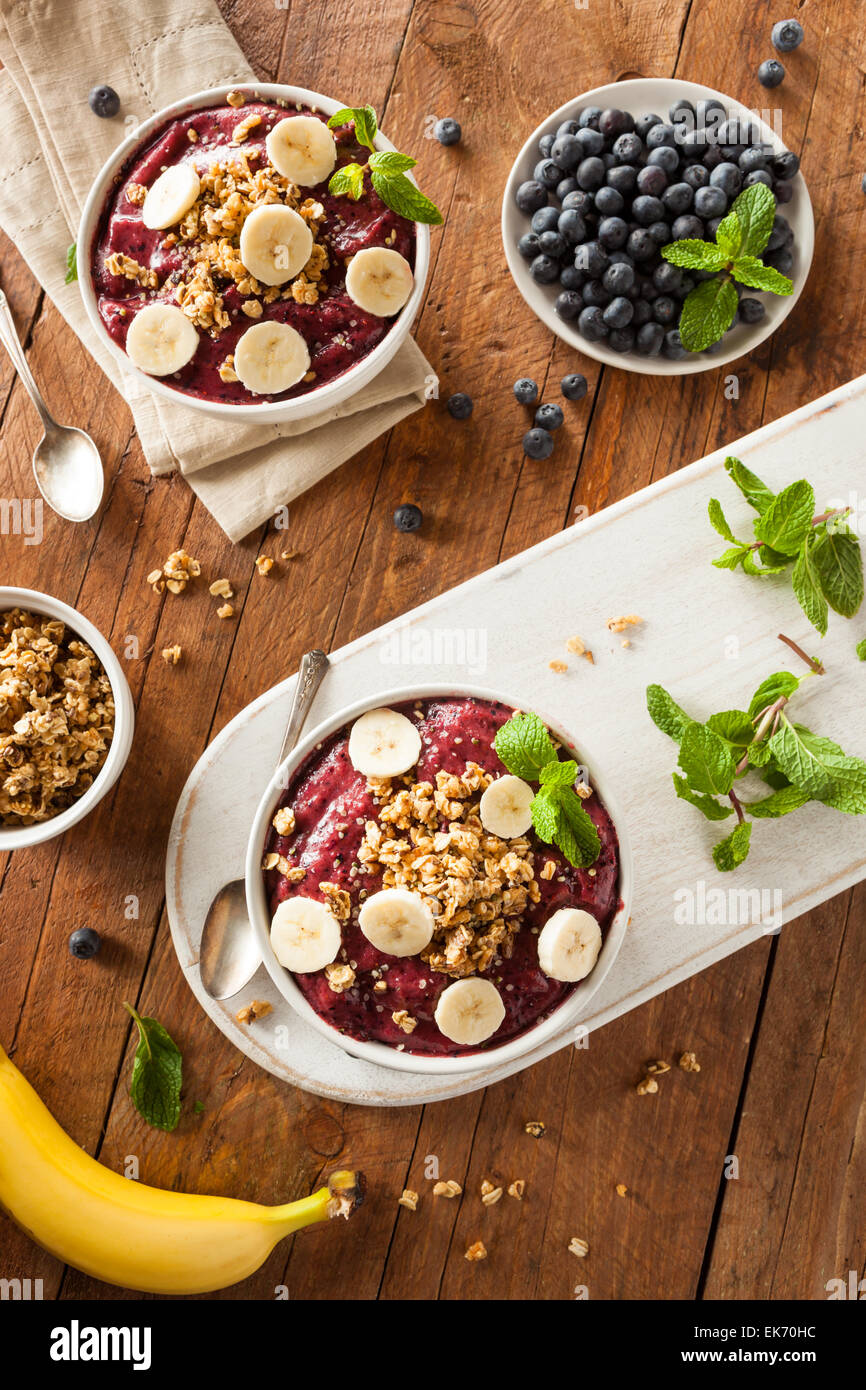 Healthy Organic Berry Smoothie Bowl with Granola and Fruit Stock Photo