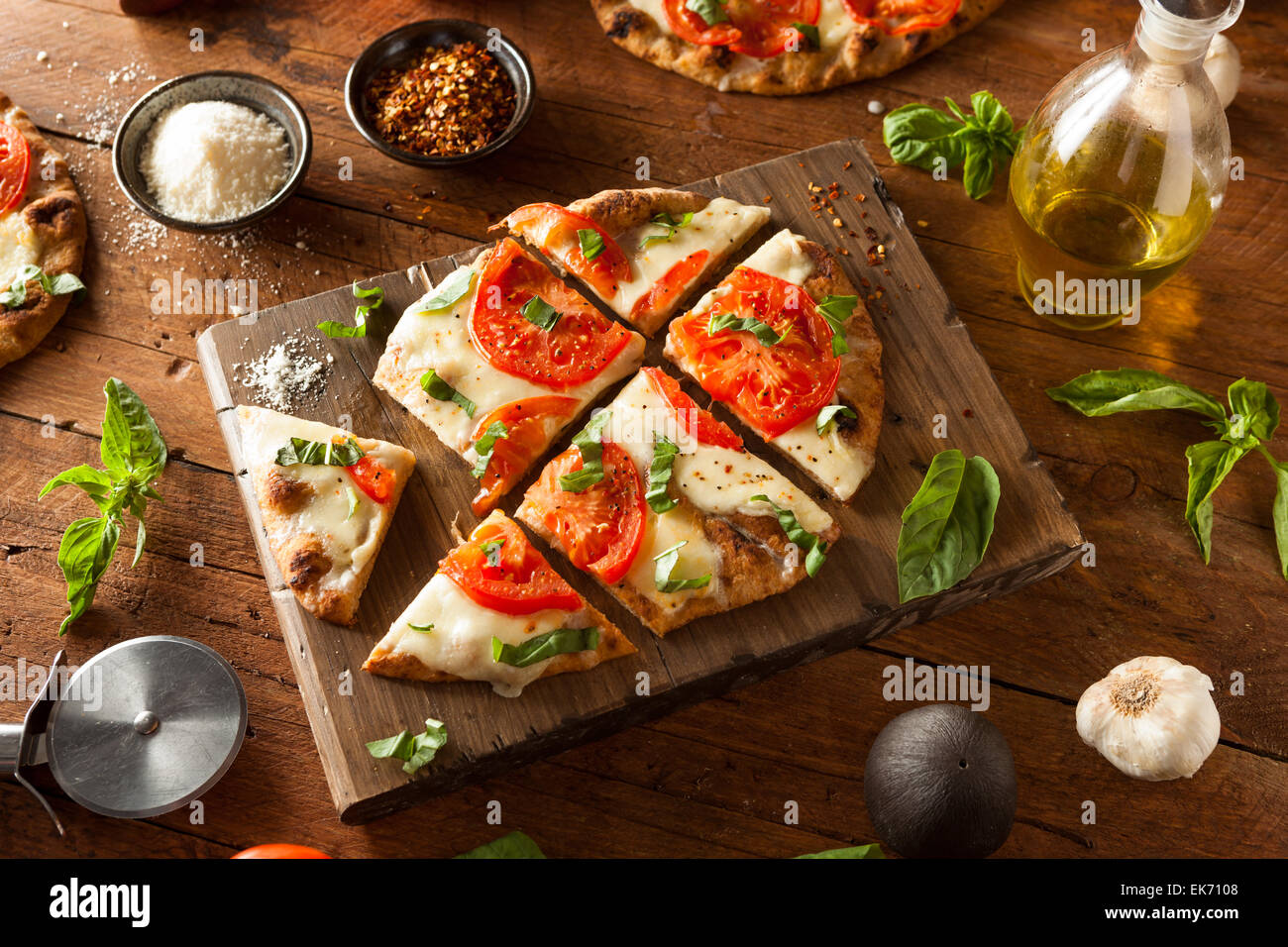 Homemade Margarita Flatbread Pizza with Tomato and Basil Stock Photo