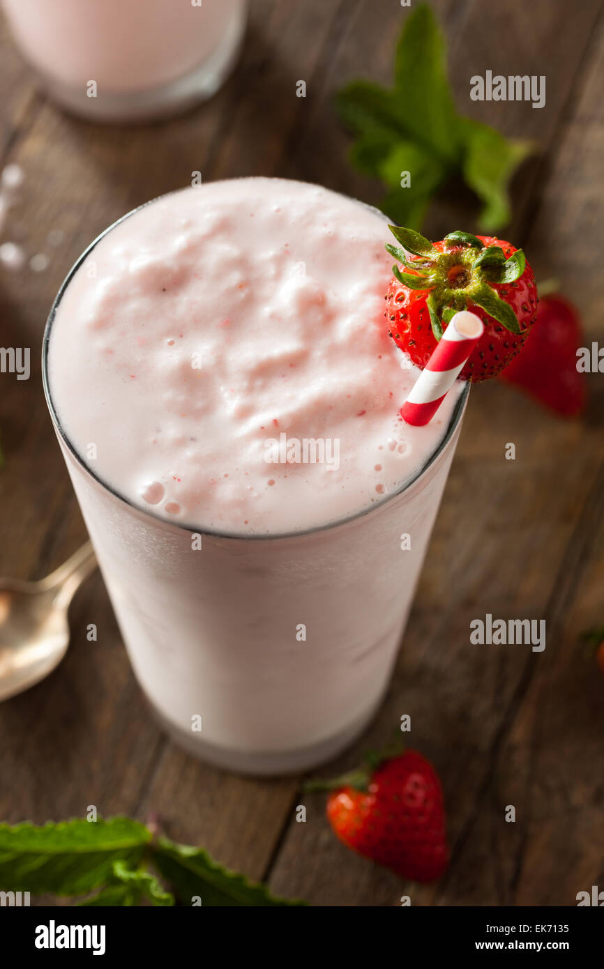 Refreshing Homemade Strawberry Milkshake in a Glass Stock Photo Alamy