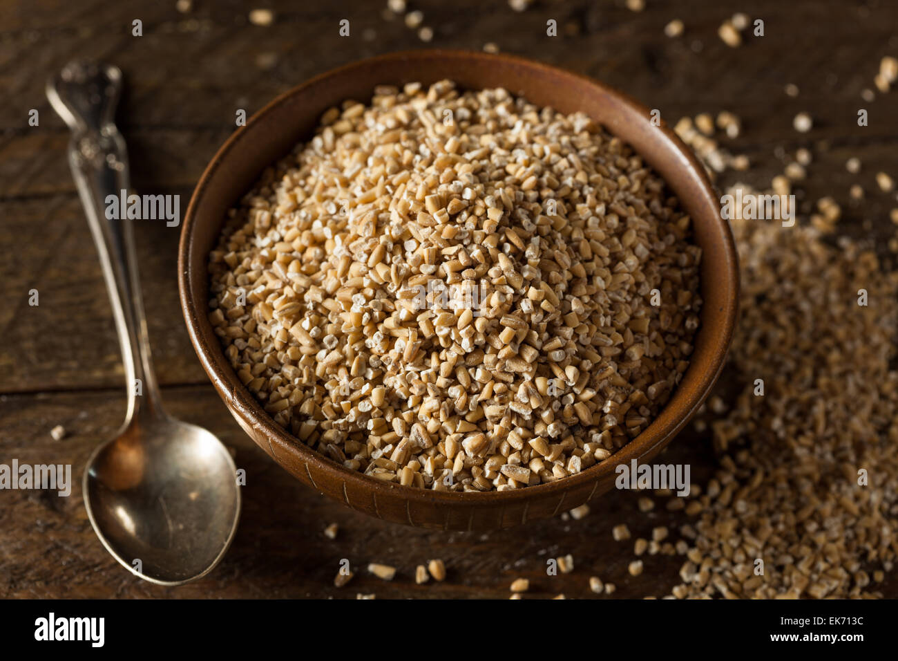 Raw Organic Steel Cut Oats in a Bowl Stock Photo