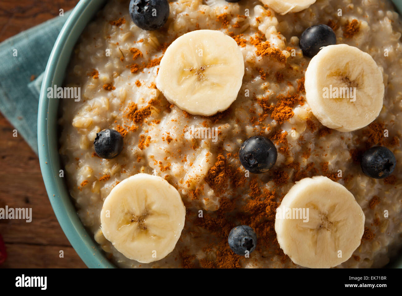 Homemade Healthy Steel Cut Oatmeal with Fruit and Cinnamon Stock Photo