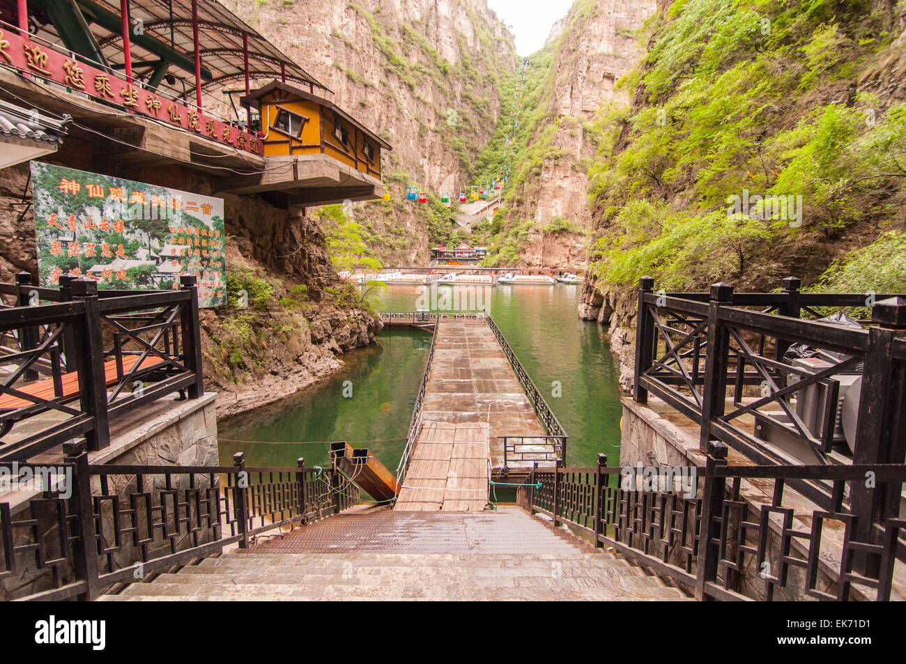 BEIJING,CHINA-MAY 24,2013: Cable car and boats in Long Qing Xia. Stock Photo