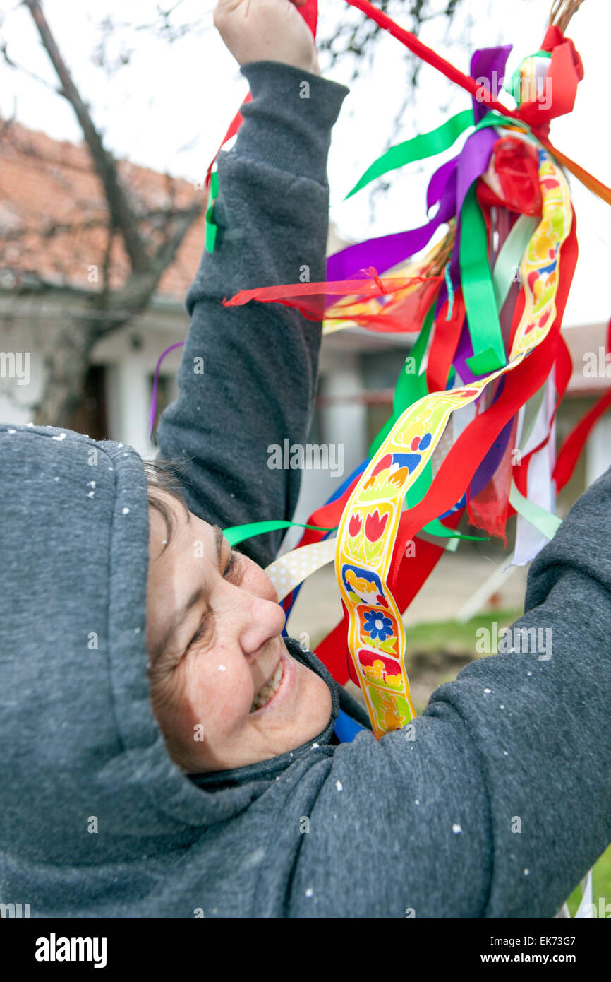 woman is considering ribbons to whip Stock Photo