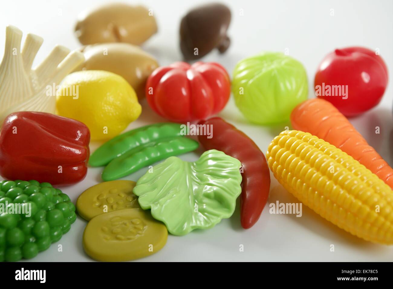 Plastic game, fake varied vegetables and fruits Stock Photo Alamy