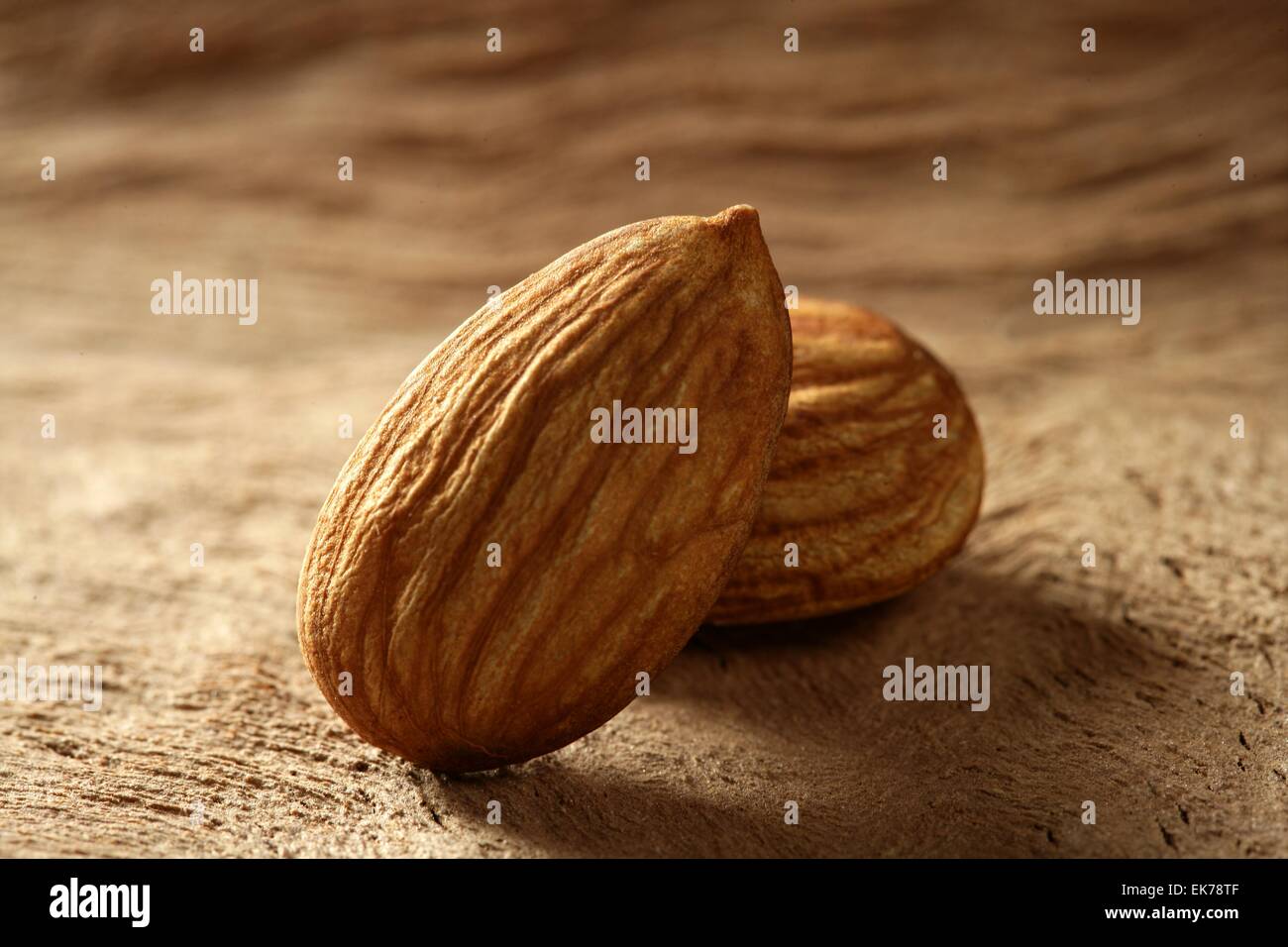 Almond macro over wood background Stock Photo Alamy