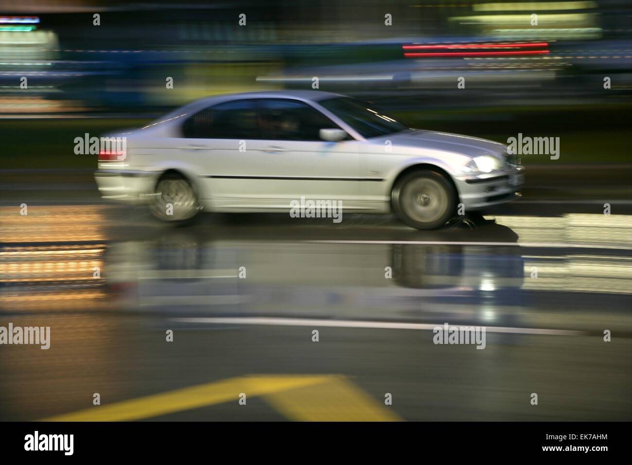 Car moving in rainy night motion blur Stock Photo - Alamy