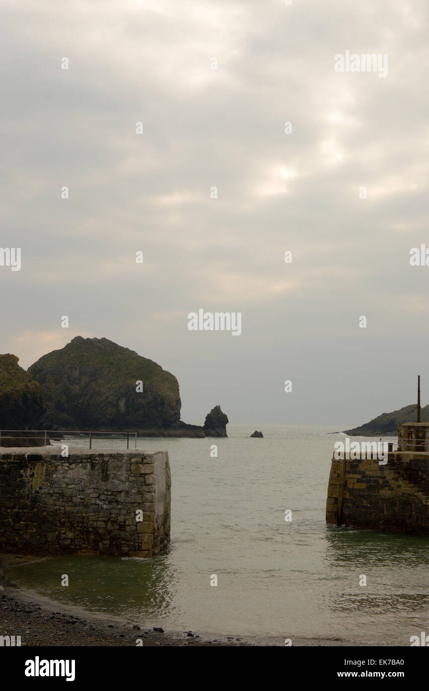 View from Mullion harbour of Mullion Cove and Mullion Island, Cornwall