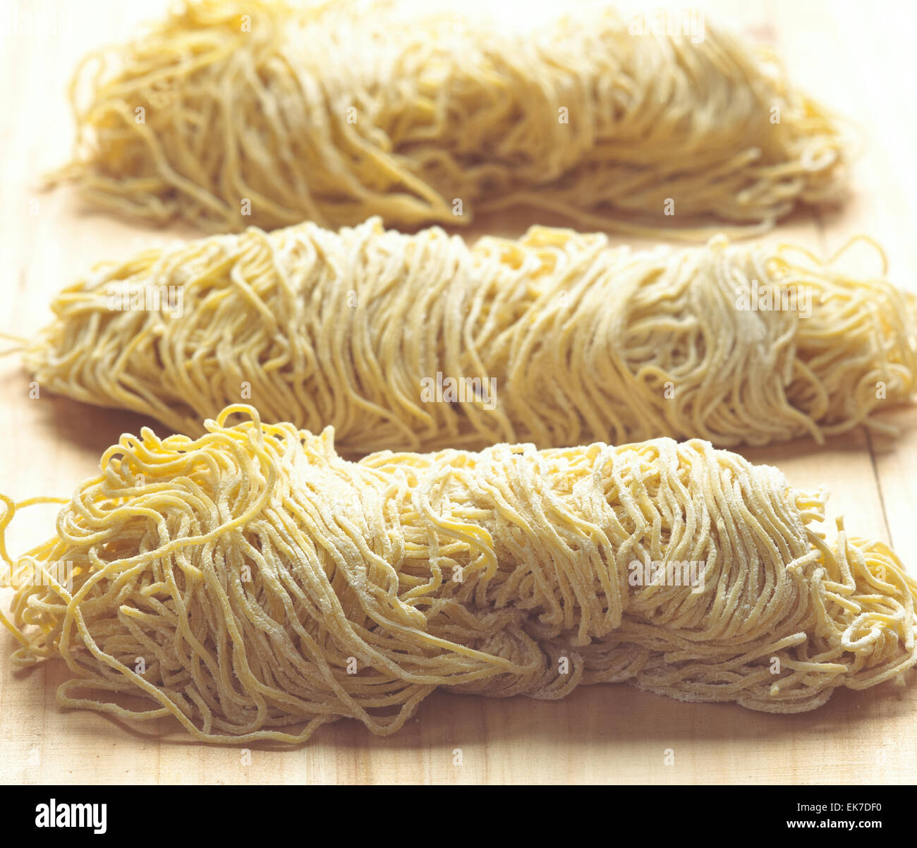 raw asian egg noodles Stock Photo - Alamy