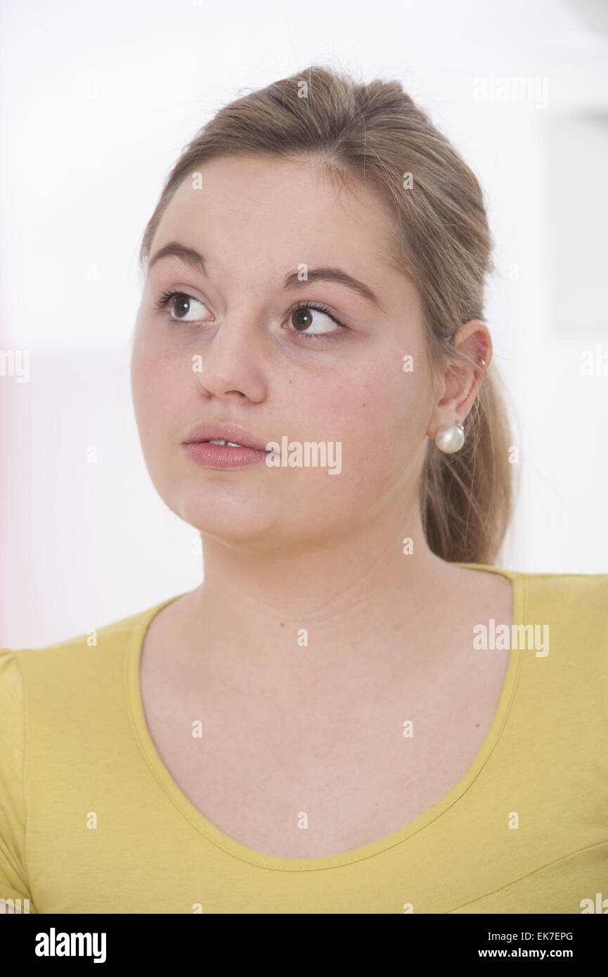 European young woman thinking hi-res stock photography and images - Alamy