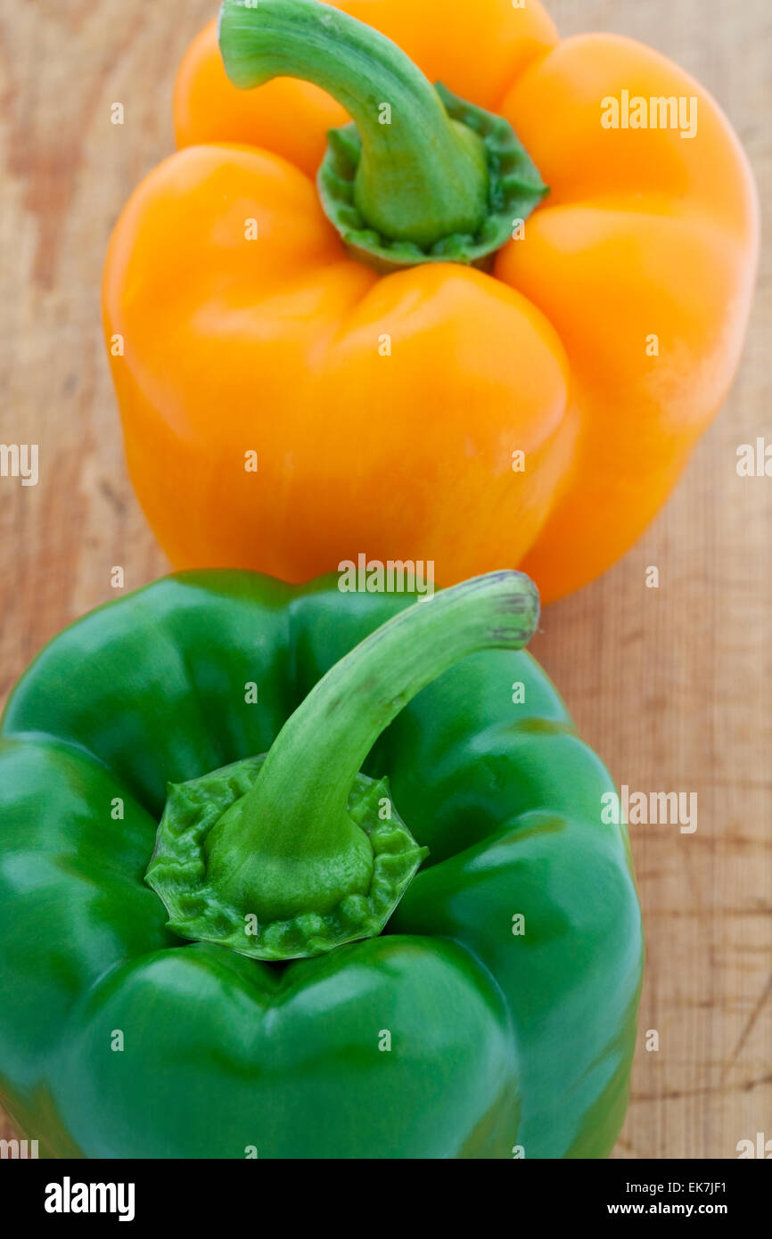 Green and orange bell peppers Stock Photo Alamy