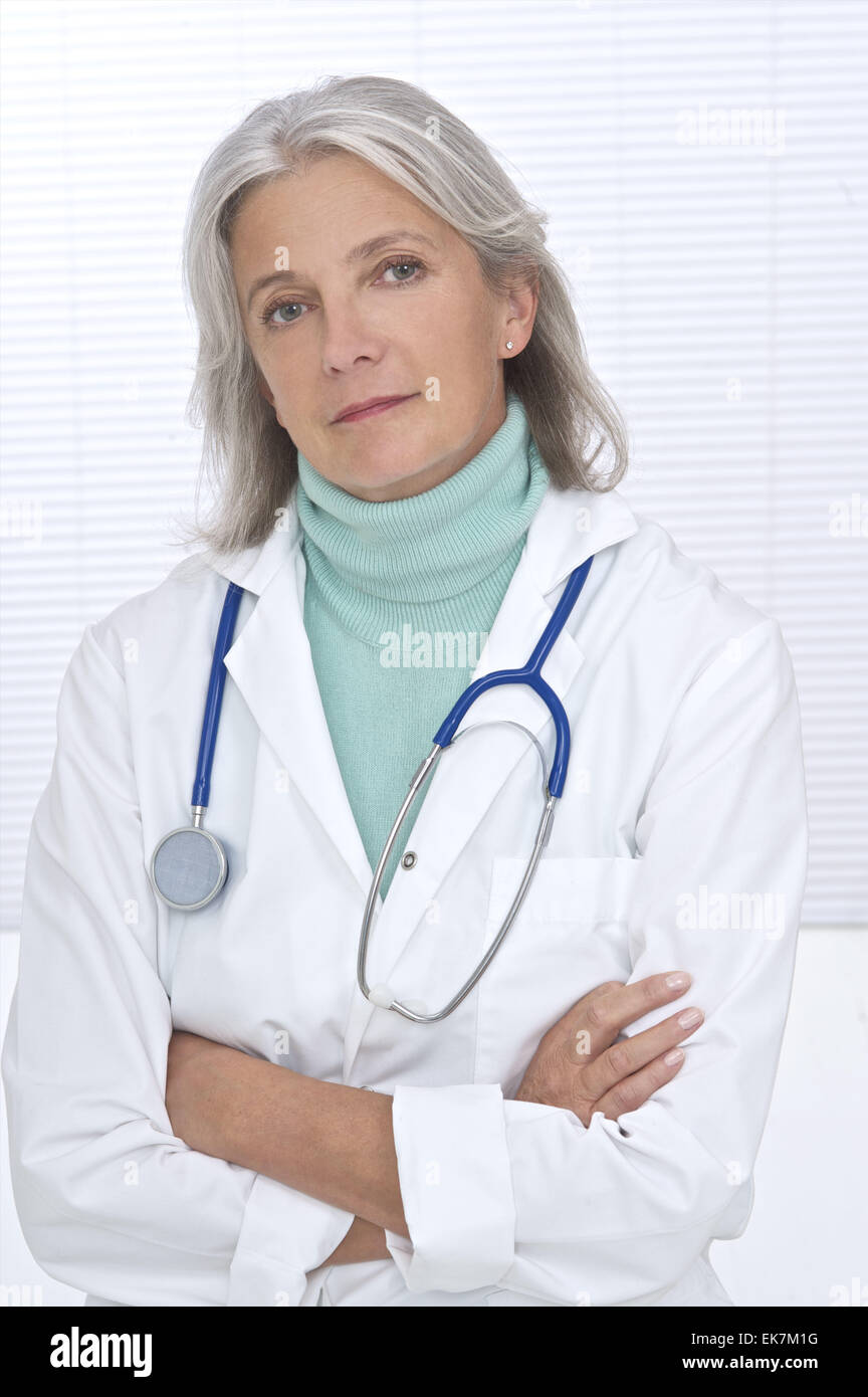 Senior woman thinking doctor hi-res stock photography and images - Alamy