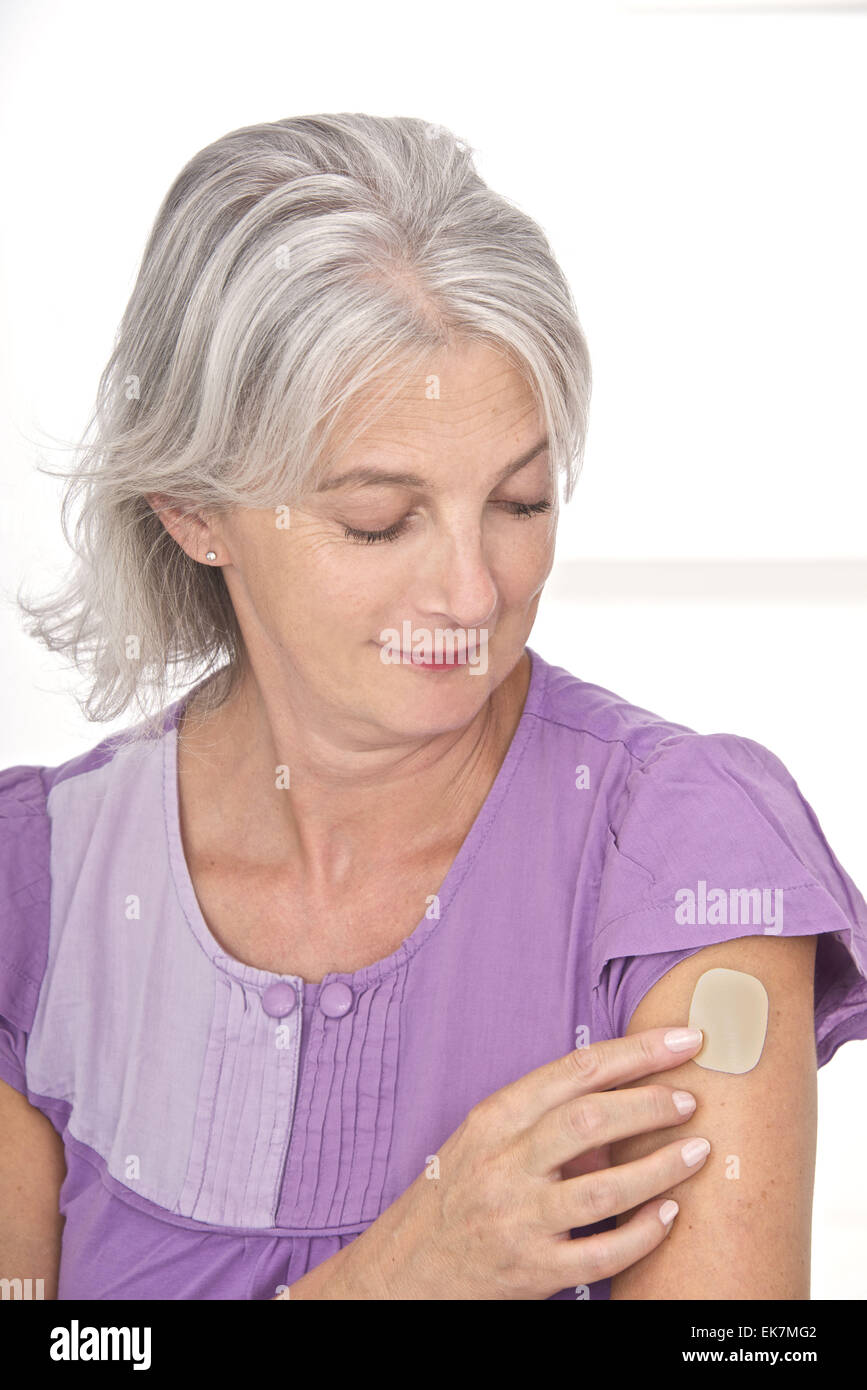 Woman nicotine patch hires stock photography and images Alamy