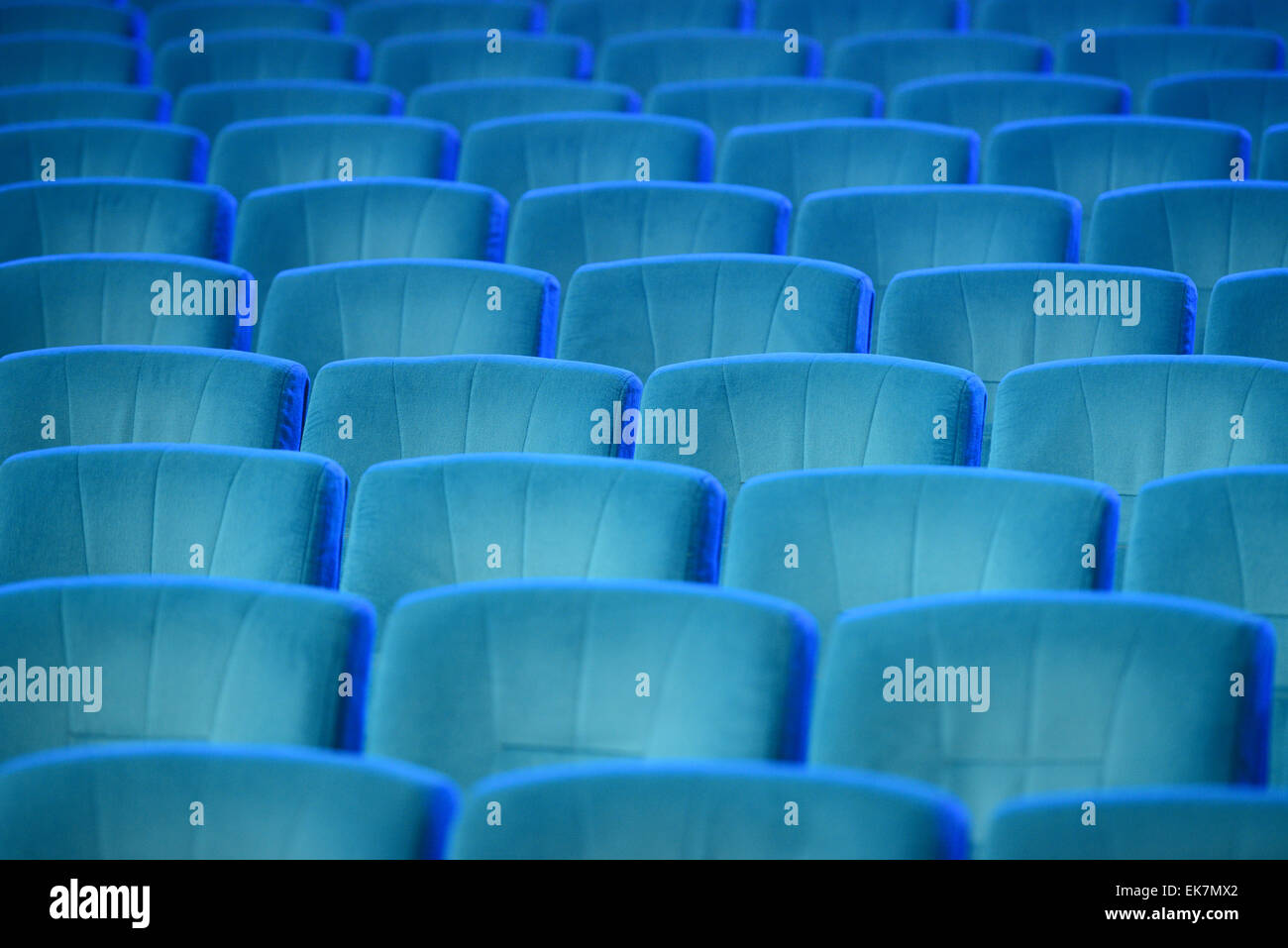 Empty comfortable green seats in theater, cinema Stock Photo