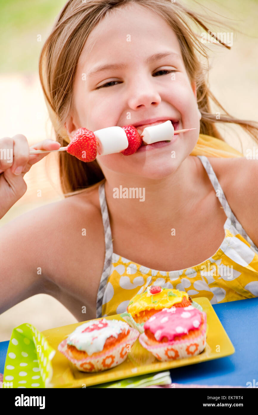 Eating a marshmallow Stock Photo Alamy