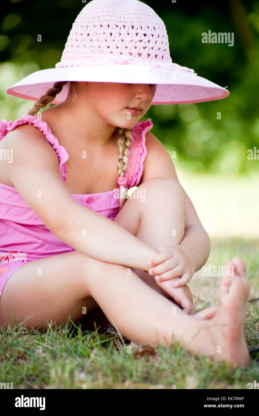 Sweet little child with a pink hat Stock Photo