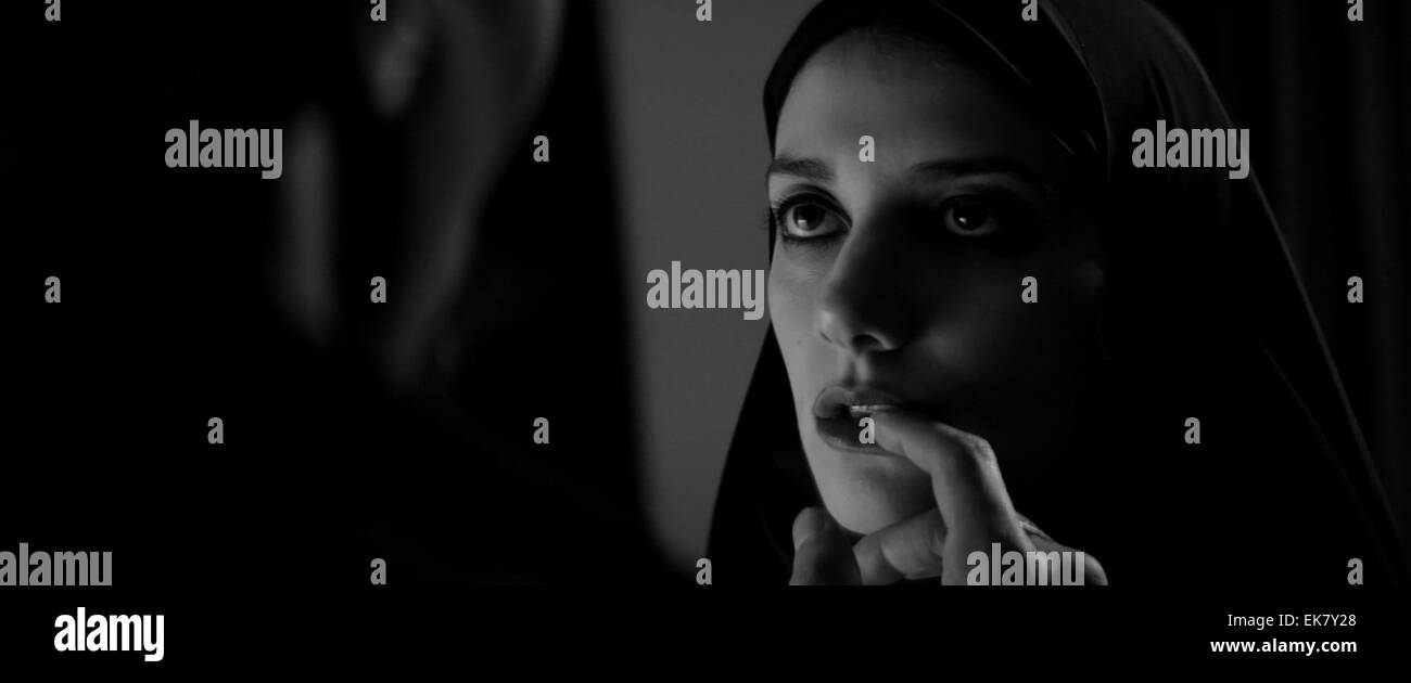 A Girl Walks Home Alone at Night is a 2014 American film directed by Ana Lily Amirpour. Tagged as 'The first Iranian vampire Western', it was chosen to show in the 'Next' program at the 2014 Sundance Film Festival. Stock Photo