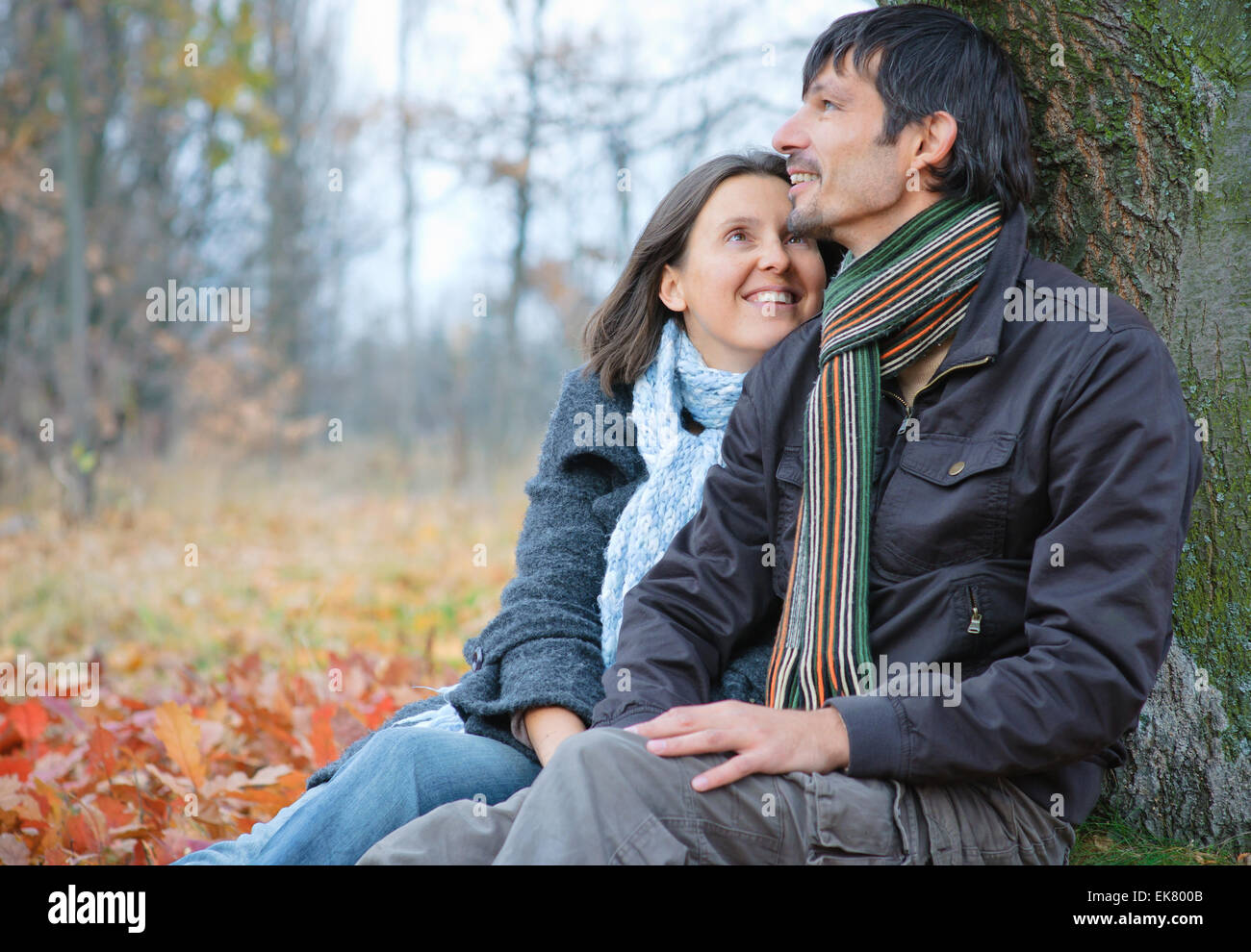 Couple In The Park Stock Photo - Alamy