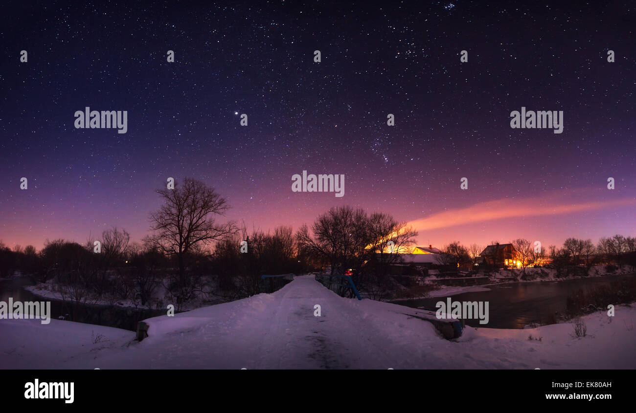 Sky full of stars. Beautiful winter night in Ukraine Stock Photo