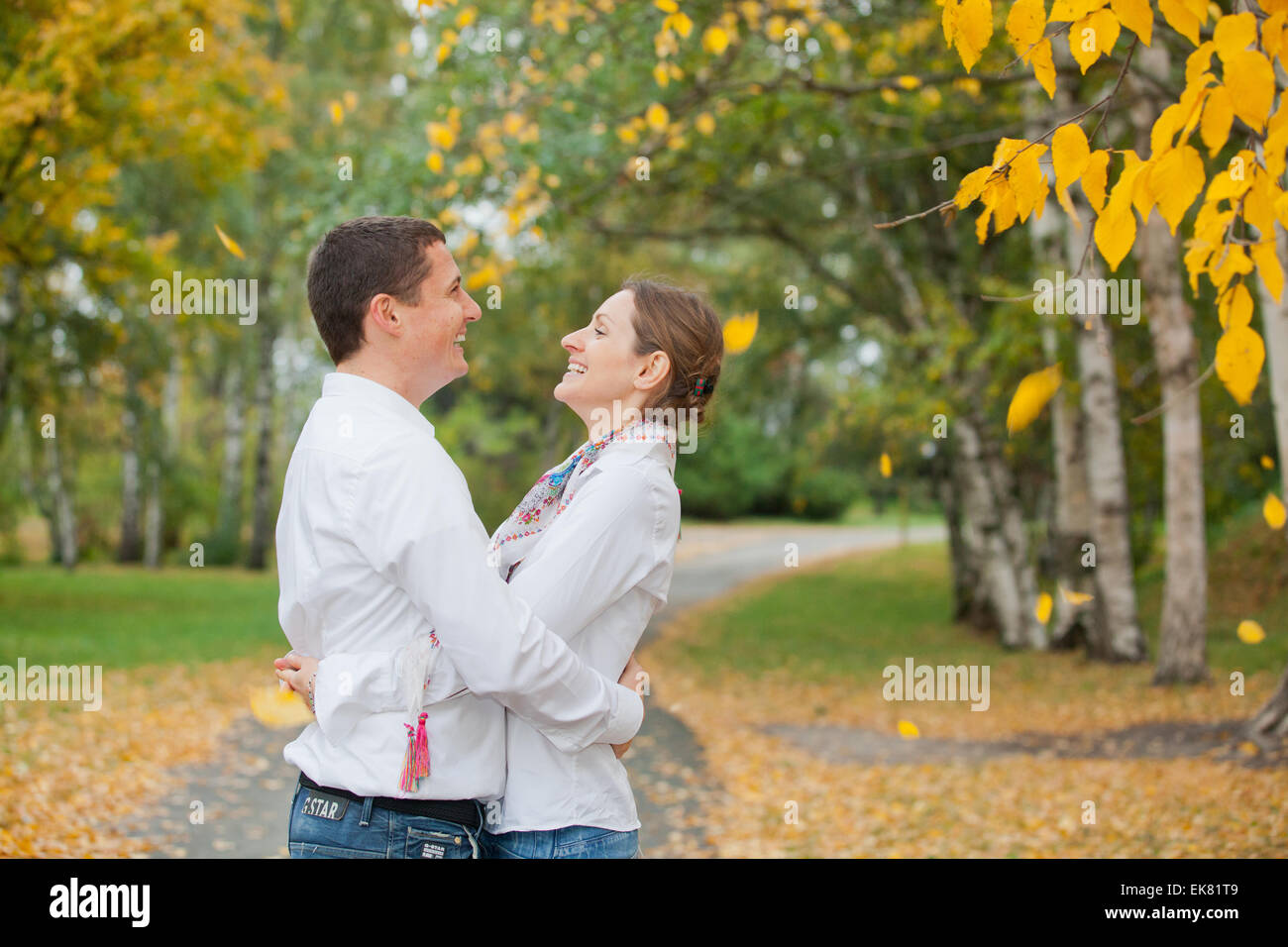 Romantic young beautiful couple on autumn walk Stock Photo - Alamy