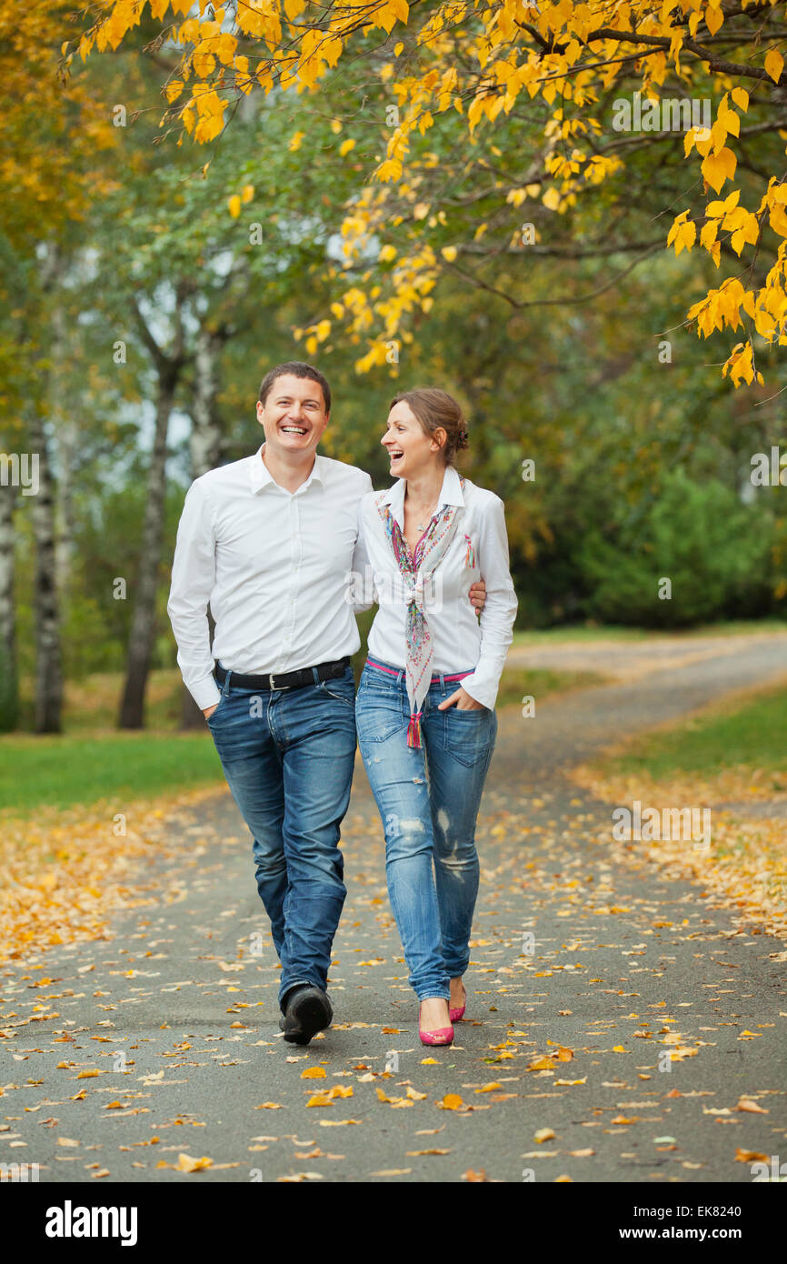 Romantic young beautiful couple on autumn walk Stock Photo - Alamy