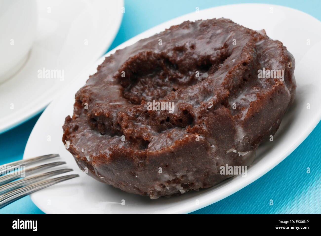 https://c8.alamy.com/comp/EK86NP/old-fashioned-chocolate-doughnut-EK86NP.jpg