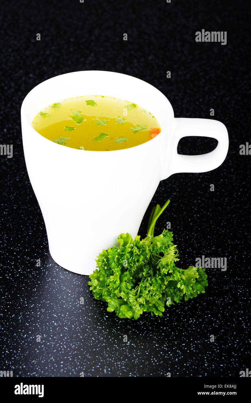 Broth in cup Stock Photo Alamy