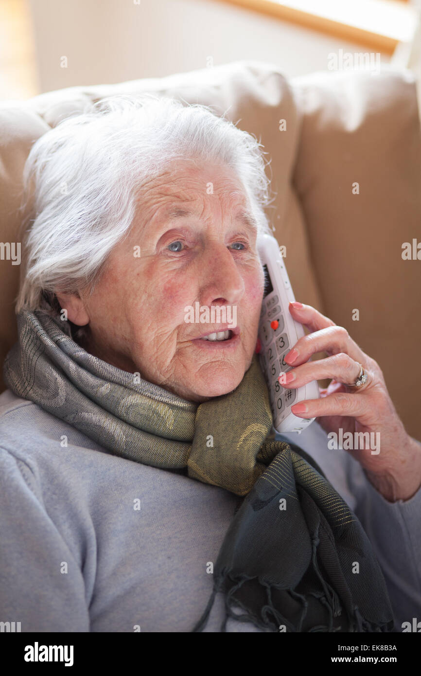 Old lady sitting in chair hi-res stock photography and images - Alamy