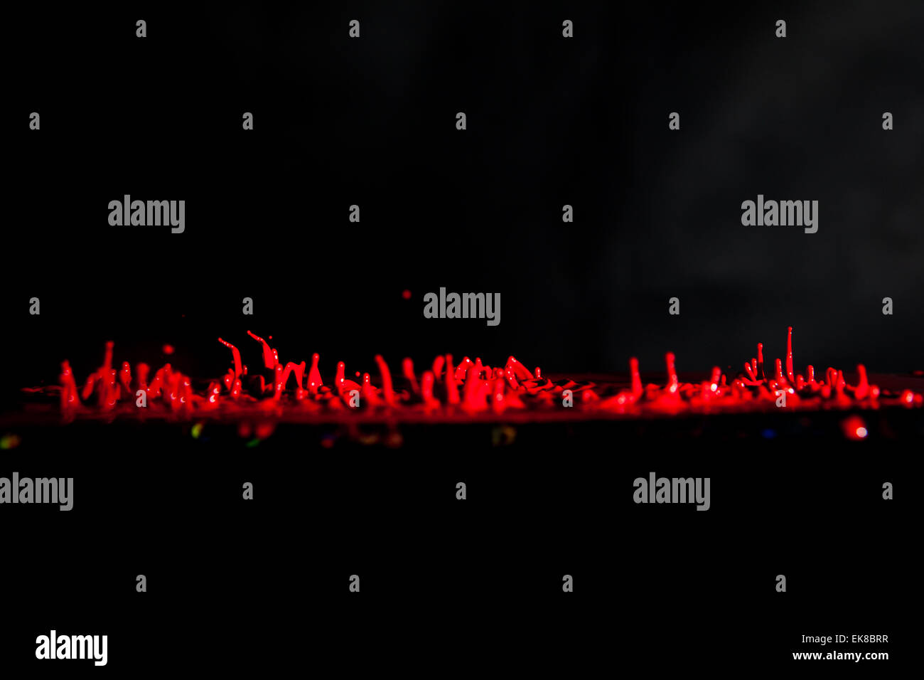 red color paint explosion exploding abstract 3d Stock Photo - Alamy