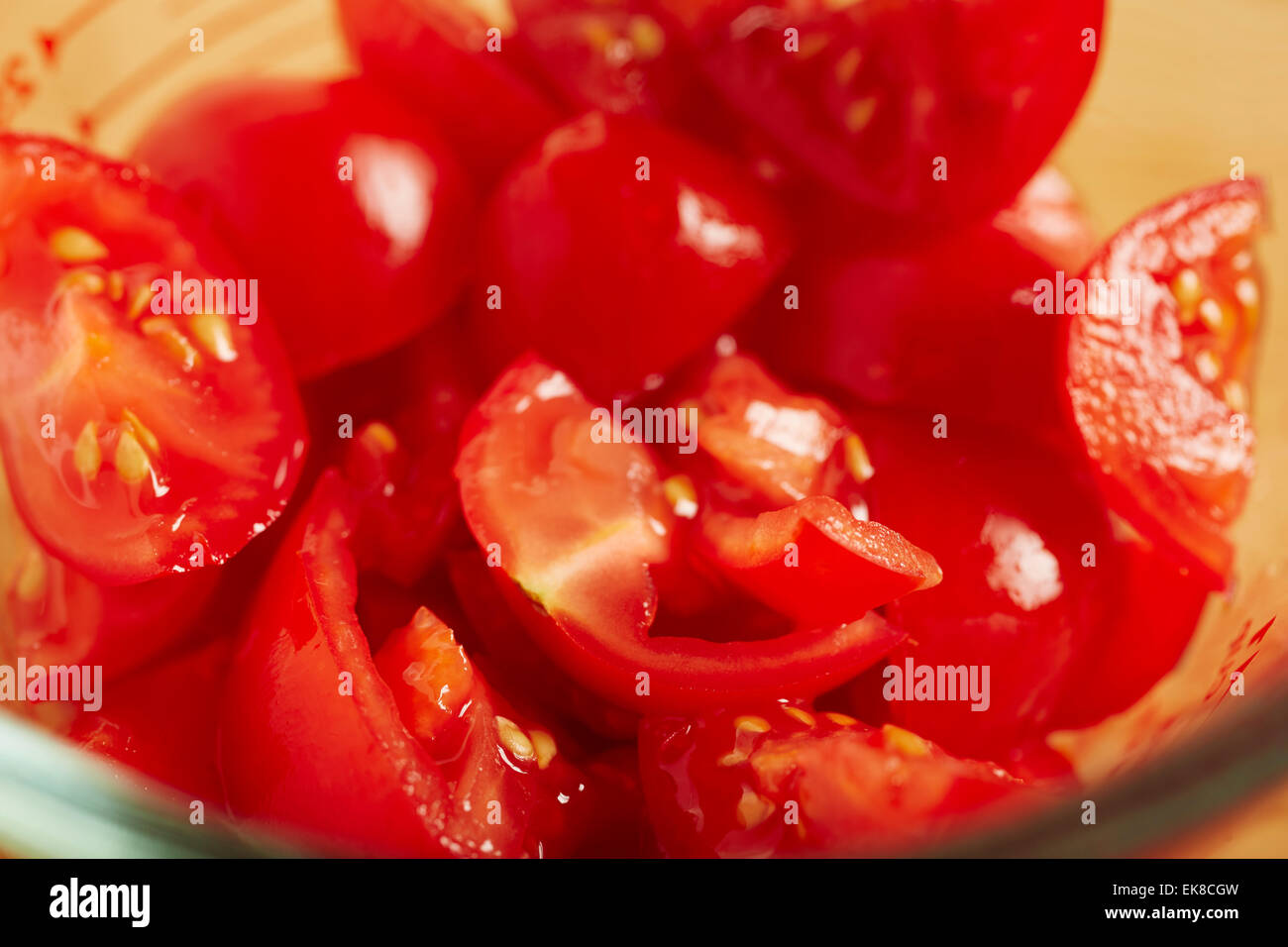 cut up wedges of cherry tomato Stock Photo