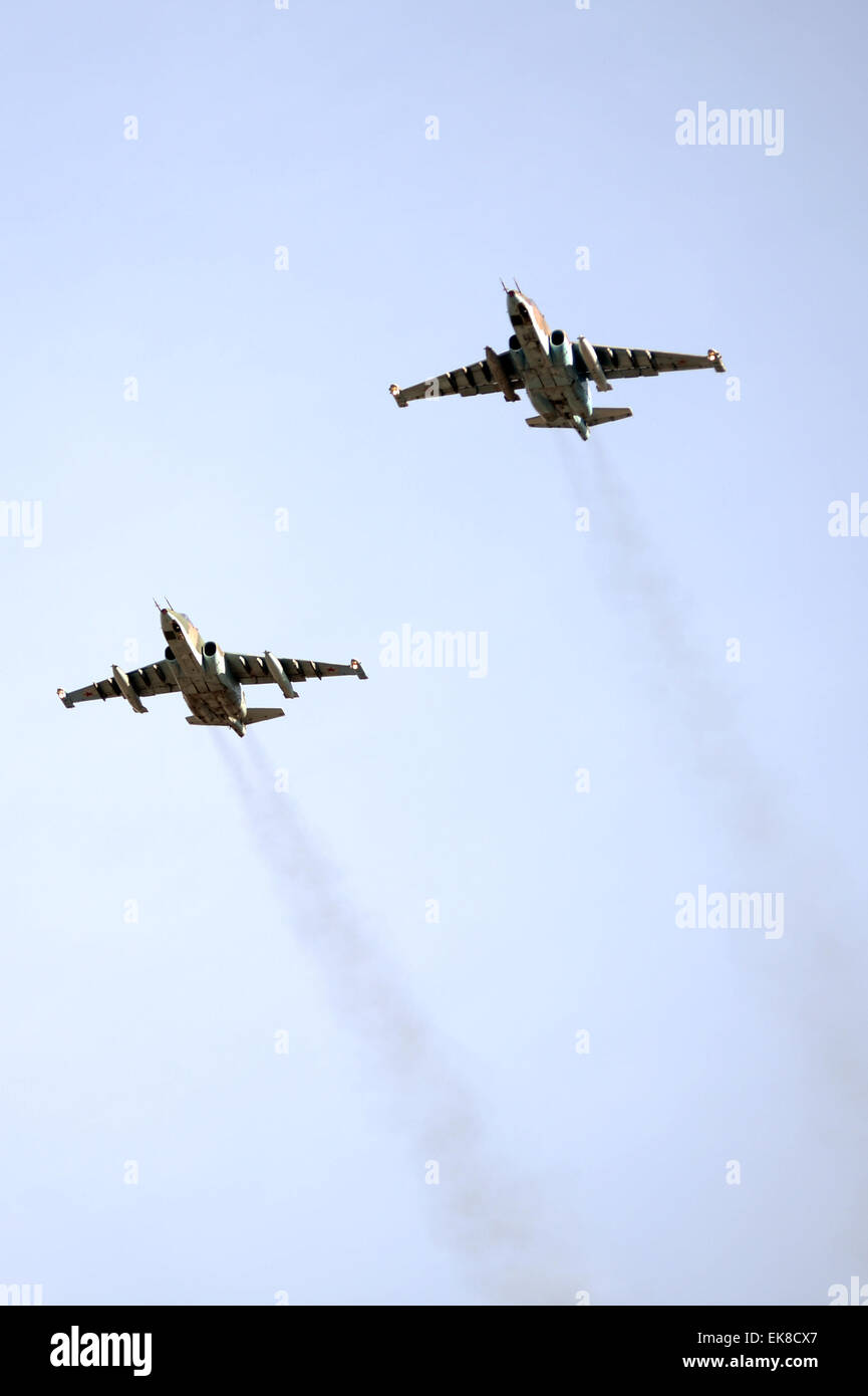 Kubinka airfield, Moscow, Russia. 8th April, 2015. A group of jet air supporters Sukhoi Su-25 fly during the parade rehearsal dedicated to the 70th anniversary of the victory in World War II, near Kubinka military airfield in the Moscow region of Russia, April 8, 2015 Credit:  Xinhua/Alamy Live News Stock Photo