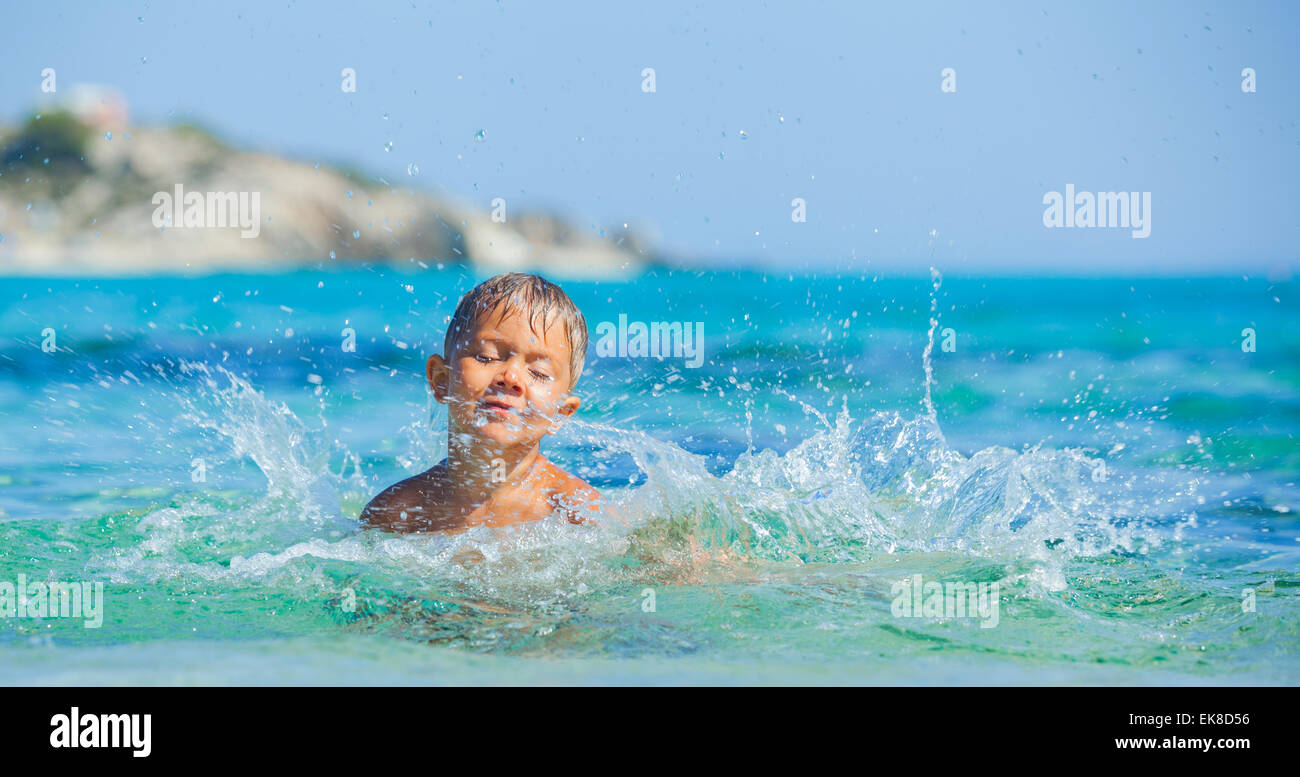 Young boy swimming in sea Stock Photo - Alamy
