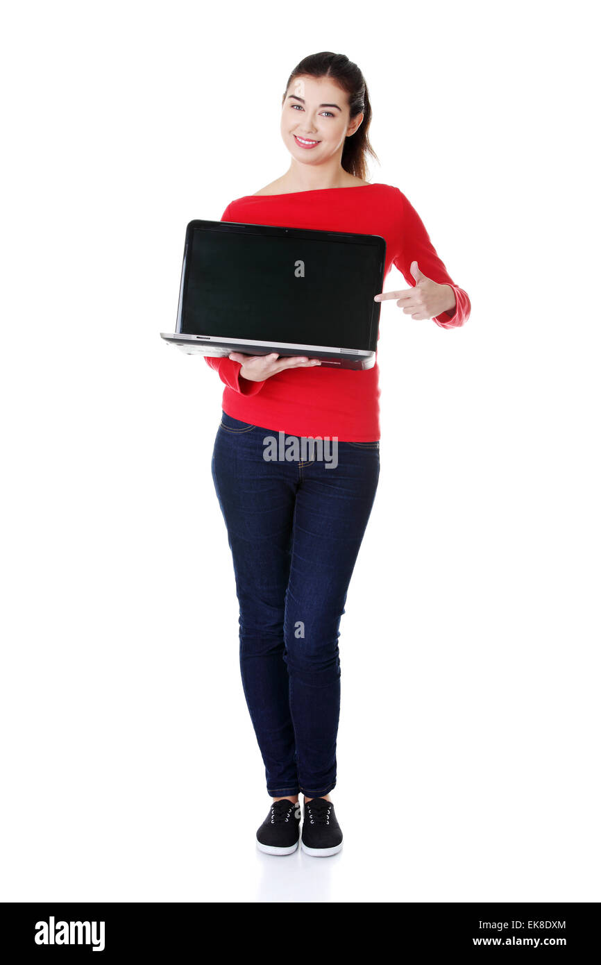 Young woman holding laptop Stock Photo - Alamy