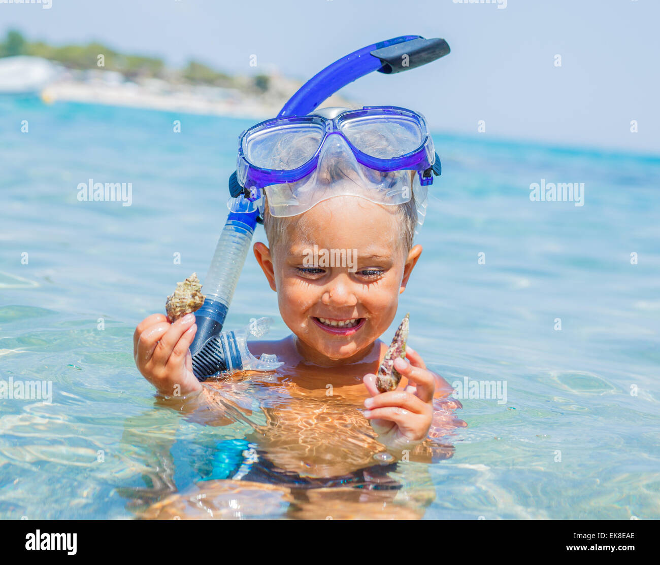 Boy swimming in sea Stock Photo - Alamy