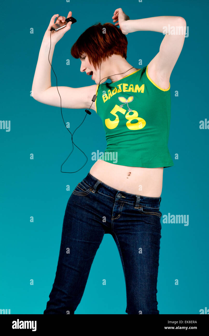 Dancing with my mp3 player Stock Photo