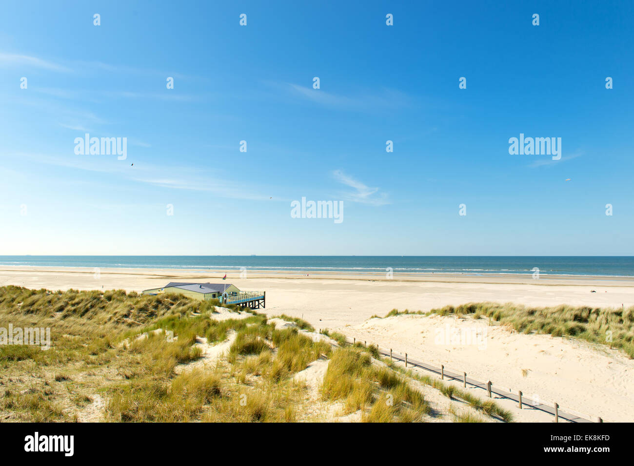 Beach with tent on Dutch coast with North sea Stock Photo - Alamy