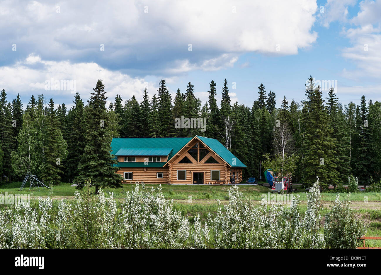 Modern log cabin home on the bankof the Chena River, Fairbanks, Alaska, USA Stock Photo