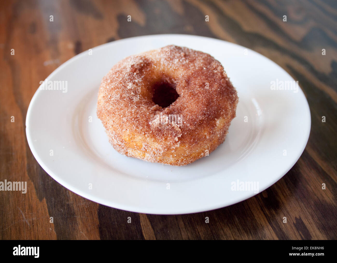 A homemade cinnamon donut from d'Lish by Tish Café in Saskatoon, Saskatchewan, Canada. Stock Photo