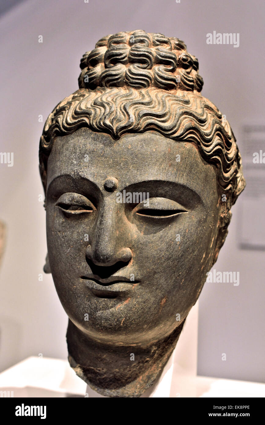 Head of Buddha, a 3rd century AD grey schist stone museum