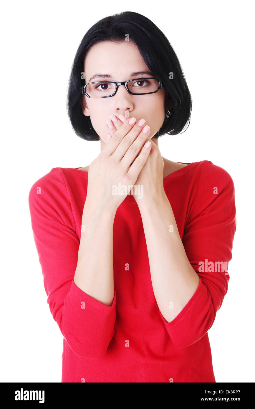 Young woman covering her mouth Stock Photo - Alamy