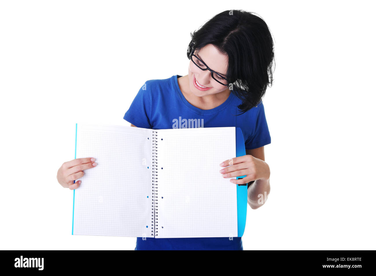 Young woman showing blank pages of her notebook Stock Photo
