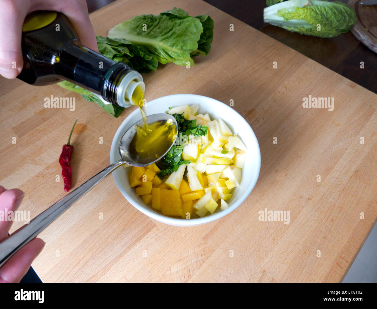 Romaine salad dressing is prepared Stock Photo Alamy