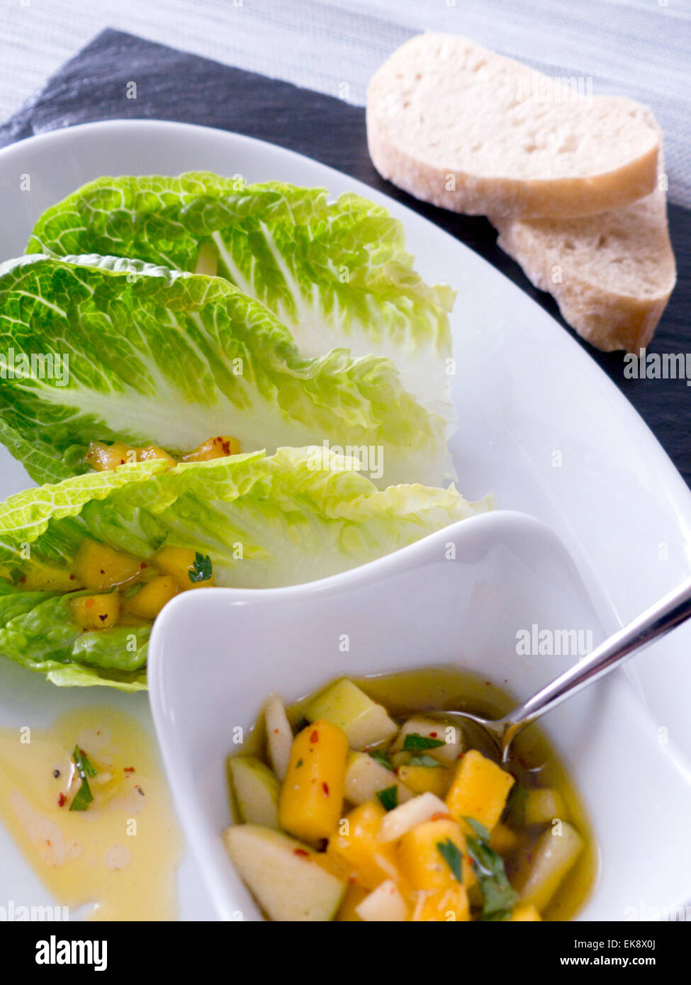 Romaine lettuce with apple mango vinaigrette Stock Photo