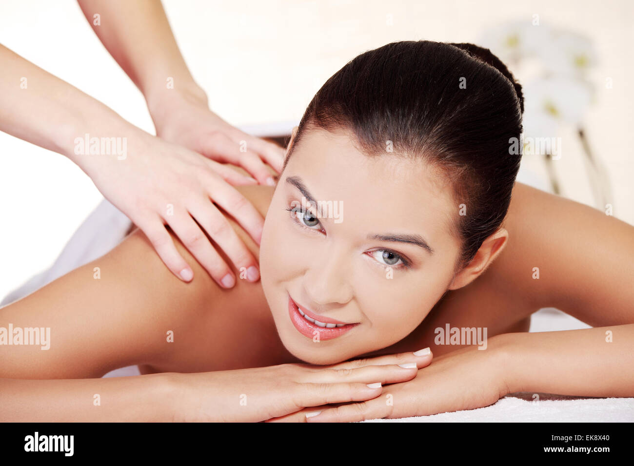 Young woman relaxing in spa saloon Stock Photo