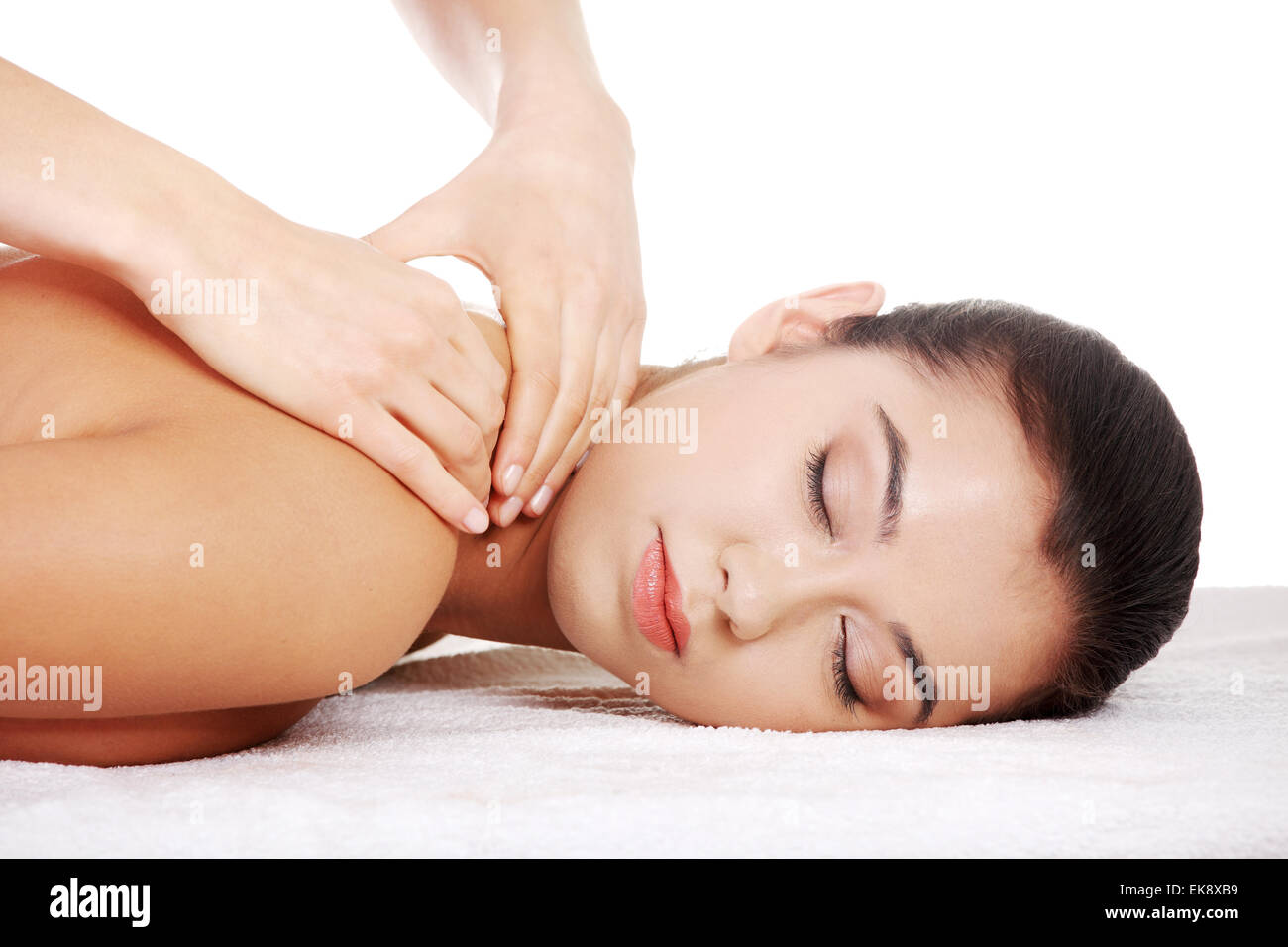 Preaty young woman relaxing in spa saloon Stock Photo
