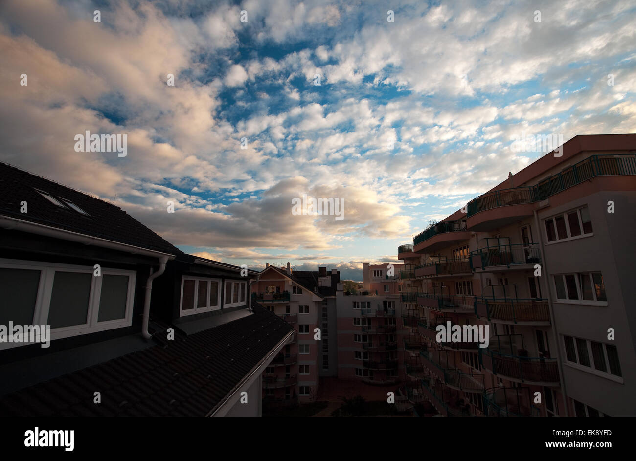 a house against the blue sky with the clouds Stock Photo - Alamy