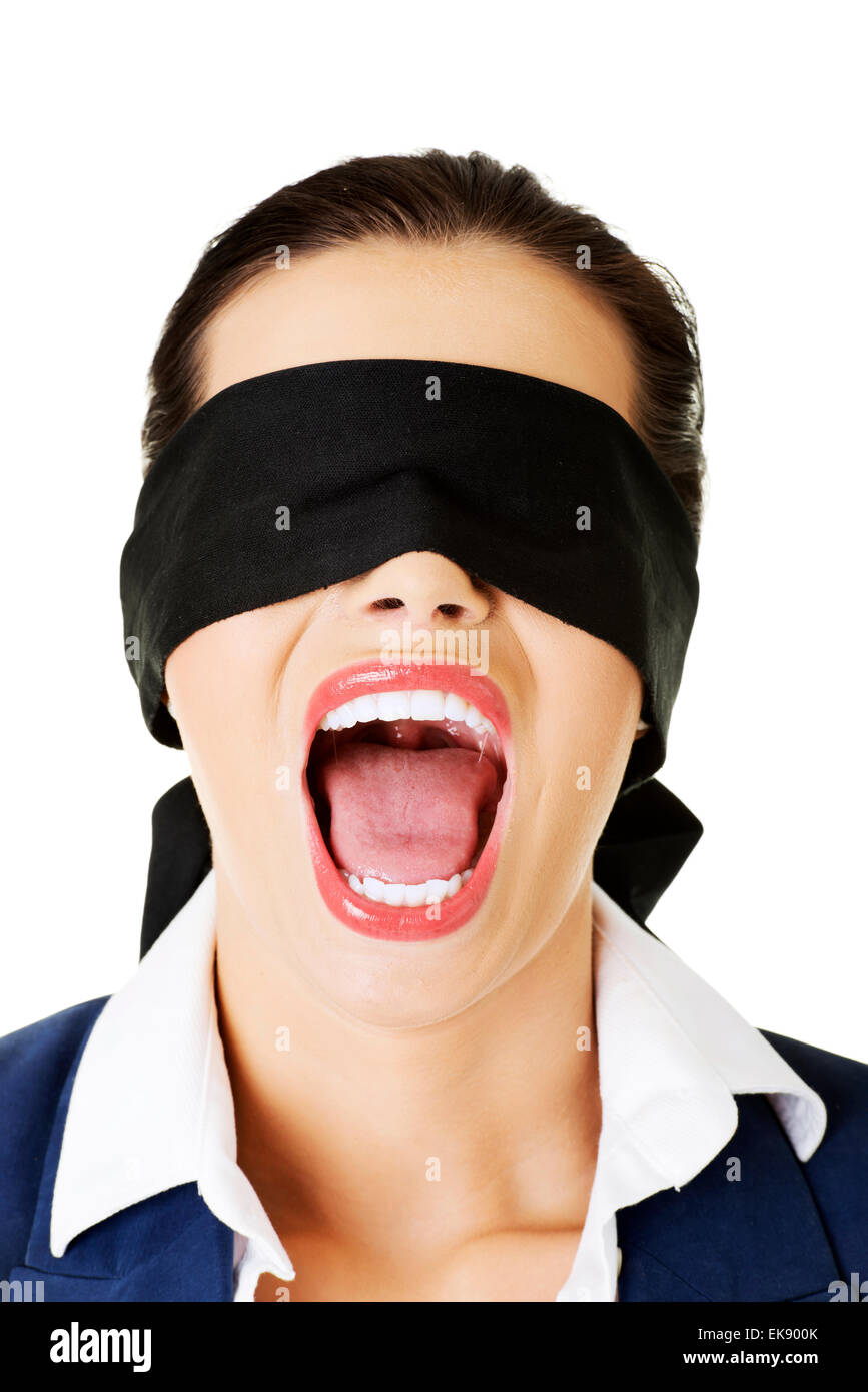 Beautiful frighten young blindfold woman Stock Photo