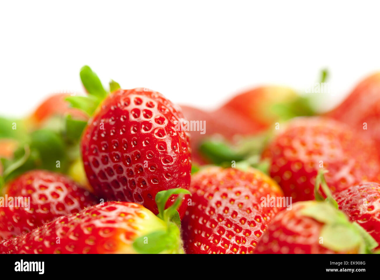 juicy strawberries isolated on white Stock Photo - Alamy