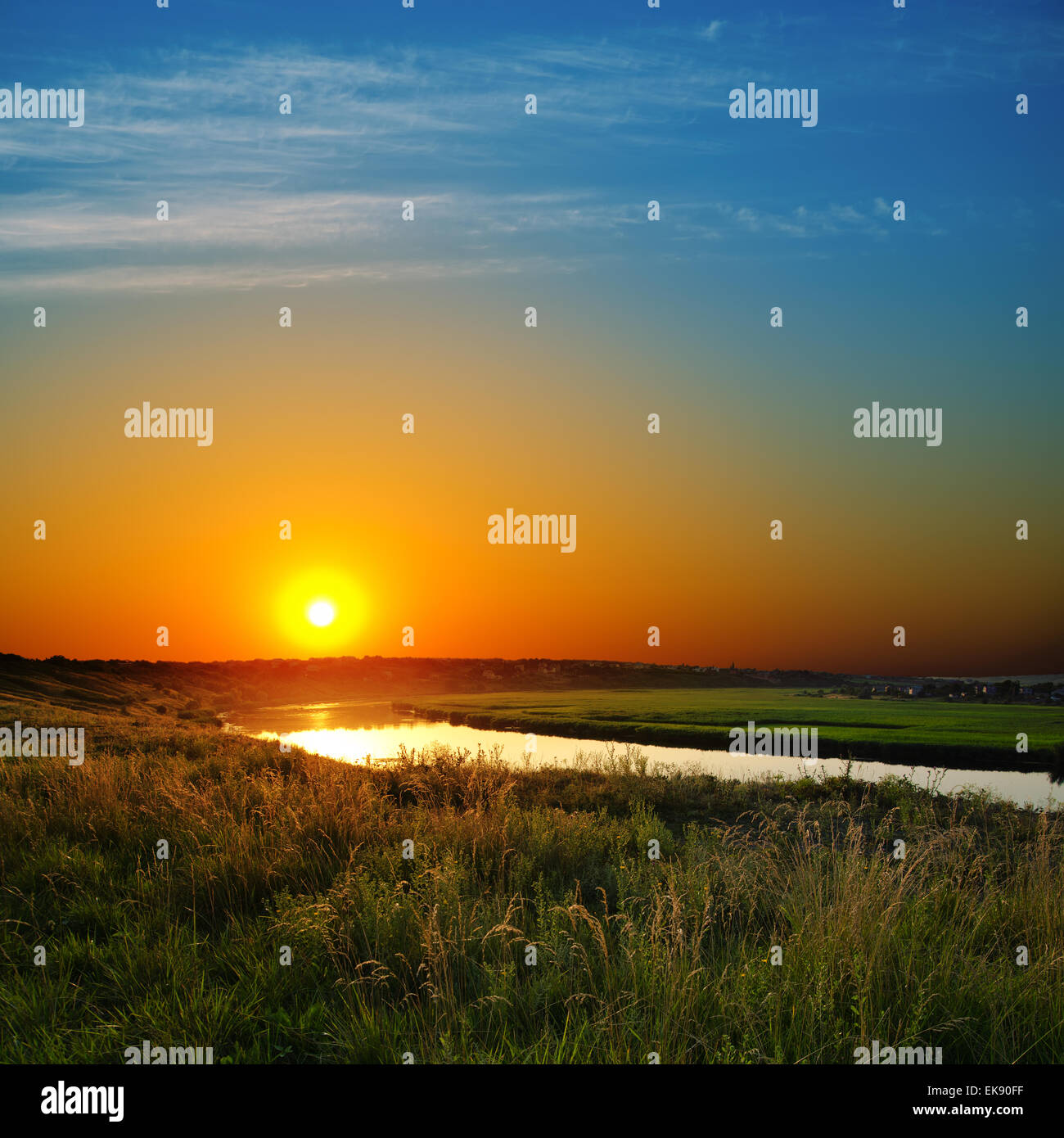 dramatic sunset over river Stock Photo - Alamy