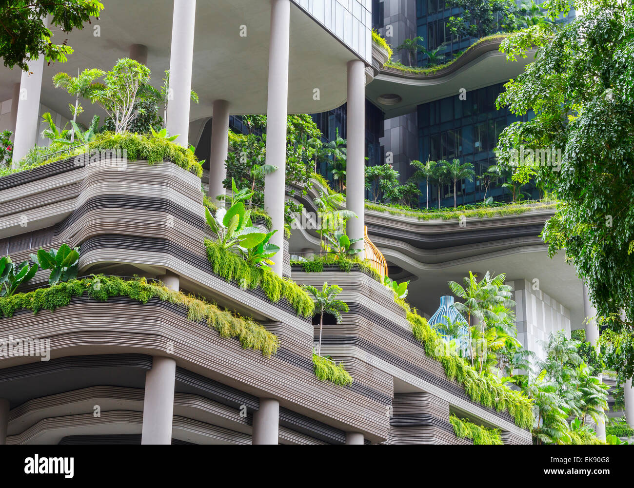 Hotel with luxuriant balconies Stock Photo