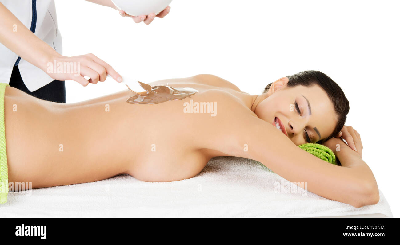 Spa saloon- chocolate massage. Stock Photo